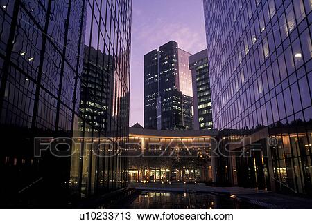 Stock Image -  Charlotte, NC, North Carolina, Buildings in downtown Charlotte in the evening.. Fotosearch