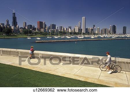 Stock Image -  Chicago, IL, Illinois, skyline, Lake Michigan, Scenic view of Chicago Harbor and the downtown skyline from the Lakeshore in Chicago.. Fotosearch