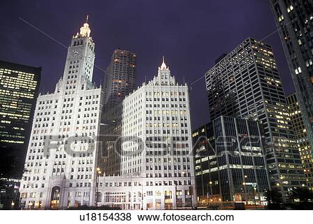 Chicago, IL, Illinois, The Wrigley Building and downtown skyline of Chicago illuminated at night. View Large Photo Image Stock Photo - Chicago, IL, Illinois, The Wrigley Building and downtown skyline of Chicago illuminated at night.. Fotosearch