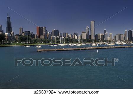 Chicago, IL, skyline, Illinois, Lake Michigan, Scenic view of Chicago Harbor and the downtown skyline of Chicago. View Large Photo Image Picture - Chicago, IL, skyline, Illinois, Lake Michigan, Scenic view of Chicago Harbor and the downtown skyline of Chicago.. Fotosearch