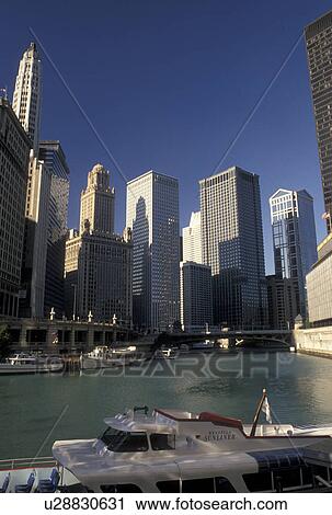 Chicago, IL, skyline, Illinois, Chicago River, A sightseeing tour boats docked along the Chicago River in downtown Chicago. View Large Photo Image Stock Image - Chicago, IL, skyline, Illinois, Chicago River, A sightseeing tour boats docked along the Chicago River in downtown Chicago.. Fotosearch
