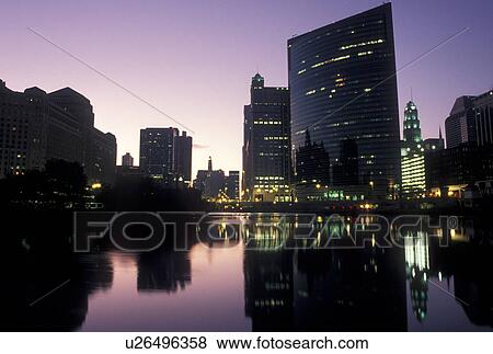 Chicago, IL, skyline, Illinois, Chicago River, Reflection of the skyline of downtown Chicago in the Chicago River at night. View Large Photo Image Stock Photo - Chicago, IL, skyline, Illinois, Chicago River, Reflection of the skyline of downtown Chicago in the Chicago River at night.. Fotosearch