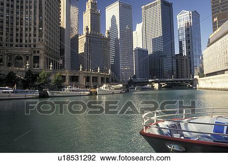 Chicago River, skyline, Chicago, IL, Illinois, A sightseeing tour boats docked along the Chicago River in downtown Chicago. View Large Photo Image Stock Image - Chicago River, skyline, Chicago, IL, Illinois, A sightseeing tour boats docked along the Chicago River in downtown Chicago.. Fotosearch