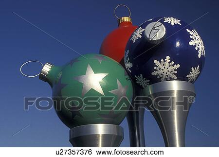christmas balls, golf club, Christmas decorations, FL, Orlando, Lake Buena Vista, Florida, Colorful Christmas balls on large spun-metal golf tees decorate the entrance to the Disney Bonnet Creek Golf Club at Eagle Pines Osprey Ridge in Walt Disney World View Large Photo Image Stock Photograph - christmas balls, golf club, Christmas decorations, FL, Orlando, Lake Buena Vista, Florida, Colorful Christmas balls on large spun-metal golf tees decorate the entrance to the Disney Bonnet Creek Golf Club at Eagle Pines Osprey Ridge in Walt Disney World . Fotosearch