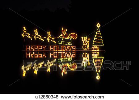 Christmas decorations, Stone Mountain, GA, Georgia, Happy Holidays, Christmas lights of Santa and his sleigh reflect in Stone Mountain Lake at night in Georgia's Stone Mountain Park View Large Photo Image Stock Photo - Christmas decorations, Stone Mountain, GA, Georgia, Happy Holidays, Christmas lights of Santa and his sleigh reflect in Stone Mountain Lake at night in Georgia's Stone Mountain Park. Fotosearch