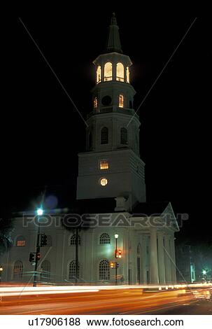 Stock Photo -  church, Charleston, South Carolina, SC, St. Michael's Episcopal Church along Broad Street in downtown Charleston in the evening.. Fotosearch