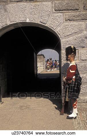Picture -  Citadel, Halifax, Nova Scotia, NS, Canada, A guard stands at the entrance to the Halifax Citadel National Historic Site in Halifax in Nova Scotia. . Fotosearch
