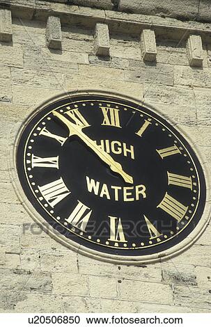 Stock Image -  clock tower, Bermuda, The West End, Sandy's Parish, Single-hand clock indicating the high tide at the Royal Naval Dockyard at the end of Ireland Island in Sandy's Parish in Bermuda. . Fotosearch