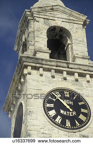 clock tower, Bermuda, The West End, Sandy's Parish, Single-hand clock indicating the high tide at the Royal Naval Dockyard at the end of Ireland Island in Sandy's Parish in Bermuda. View Large Photo Image Stock Photo - clock tower, Bermuda, The West End, Sandy's Parish, Single-hand clock indicating the high tide at the Royal Naval Dockyard at the end of Ireland Island in Sandy's Parish in Bermuda. . Fotosearch
