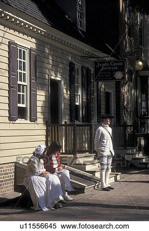 Colonial Williamsburg, VA, Williamsburg, Virginia, Interpreters dressed in authentic colonial costumes re-create life in the 18th century village of Colonial Williamsburg in Colonial Williamsburg Historic Area. View Large Photo Image Stock Photography - Colonial Williamsburg, VA, Williamsburg, Virginia, Interpreters dressed in authentic colonial costumes re-create life in the 18th century village of Colonial Williamsburg in Colonial Williamsburg Historic Area.. Fotosearch