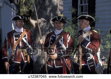 Colonial Williamsburg, VA, Williamsburg, Virginia, Men in Colonial Military uniforms in the 18th century village of Colonial Williamsburg in Colonial Williamsburg Historic Area. View Large Photo Image Stock Photography - Colonial Williamsburg, VA, Williamsburg, Virginia, Men in Colonial Military uniforms in the 18th century village of Colonial Williamsburg in Colonial Williamsburg Historic Area.. Fotosearch