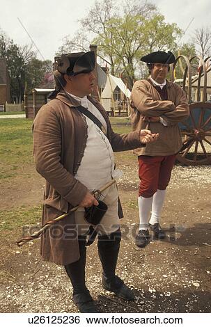 Colonial Williamsburg, Williamsburg, Virginia, VA, Men dressed in authentic 18th-century attire give a demonstration at the Colonial Williamsburg Historic Area in Williamsburg. View Large Photo Image Stock Photograph - Colonial Williamsburg, Williamsburg, Virginia, VA, Men dressed in authentic 18th-century attire give a demonstration at the Colonial Williamsburg Historic Area in Williamsburg.. Fotosearch