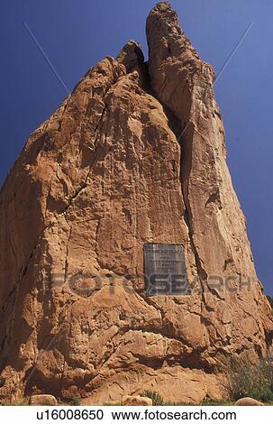 Stock Image -  Colorado Springs, Garden of the Gods, CO, Colorado, A plaque is displayed on a red sandstone rock formation at the Garden of the Gods in Colorado Springs.. Fotosearch
