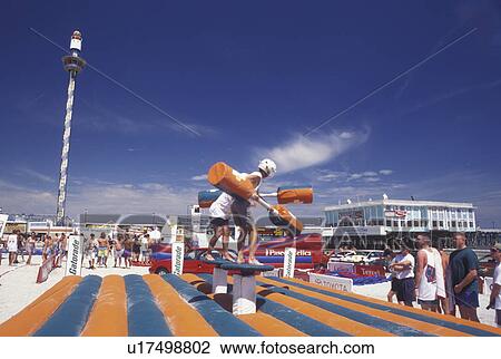 Stock Image -  Daytona Beach, FL, Florida, Gladiator Game on the beach at Spring Break in Daytona Beach.. Fotosearch
