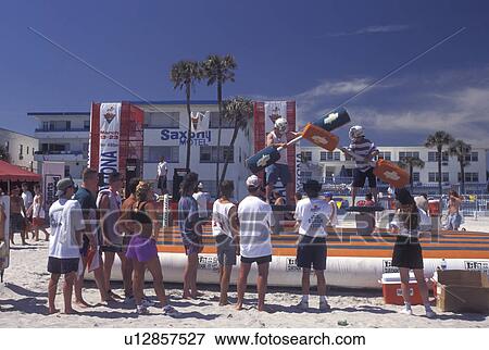 Stock Photo -  Daytona Beach, FL, Florida, Gladiator Game on the beach at Spring Break in Daytona Beach.. Fotosearch
