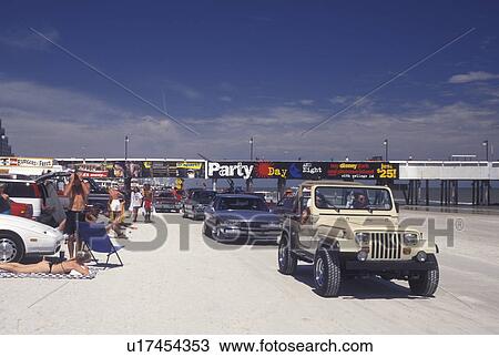 Daytona Beach, Spring Break, FL, Florida, Cruising the beach with cars on Spring Break at Daytona Beach. View Large Photo Image Stock Image - Daytona Beach, Spring Break, FL, Florida, Cruising the beach with cars on Spring Break at Daytona Beach.. Fotosearch