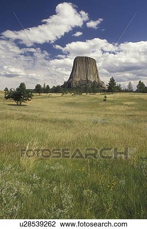 Stock Image -  Devils Tower National Monument, WY, Wyoming, Scenic view of Devils Tower at Devils Tower Nat'l Monument in Wyoming.. Fotosearch