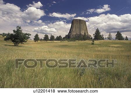 Devils Tower National Monument, WY, Wyoming, Scenic view of Devils Tower at Devils Tower Nat'l Monument in Wyoming. View Large Photo Image Stock Photo - Devils Tower National Monument, WY, Wyoming, Scenic view of Devils Tower at Devils Tower Nat'l Monument in Wyoming.. Fotosearch