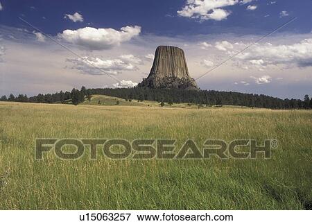 Devils Tower National Monument, WY, Wyoming, Scenic view of Devils Tower at Devils Tower Nat'l Monument in Wyoming. View Large Photo Image Stock Photo - Devils Tower National Monument, WY, Wyoming, Scenic view of Devils Tower at Devils Tower Nat'l Monument in Wyoming.. Fotosearch