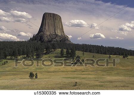 Devils Tower National Monument, WY, Wyoming, Scenic view of Devils Tower at Devils Tower Nat'l Monument in Wyoming. View Large Photo Image Stock Photography - Devils Tower National Monument, WY, Wyoming, Scenic view of Devils Tower at Devils Tower Nat'l Monument in Wyoming.. Fotosearch