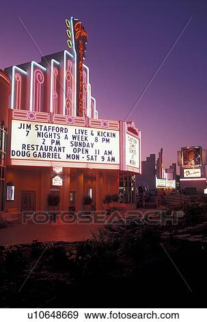 Stock Photo -  dinner theater, Branson, MO, Missouri, 76 Country Boulevard, The Strip, Jim Stafford Theatre in Branson in the evening.. Fotosearch
