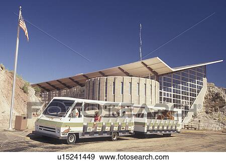 Dinosaur National Monument, Jensen, UT, Utah, Shuttle bus waiting for passengers outside the Dinosaur Quarry Building at Dinosaur Nat'l Monument in Jensen. View Large Photo Image Stock Photo - Dinosaur National Monument, Jensen, UT, Utah, Shuttle bus waiting for passengers outside the Dinosaur Quarry Building at Dinosaur Nat'l Monument in Jensen.. Fotosearch
