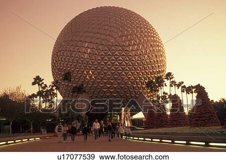 Stock Photo -  Disney World, Orlando, FL, Epcot, Lake Buena Vista, Florida, Christmas trees made of poinsettias decorate the grounds of Spaceship Earth in Epcot Center at Walt Disney World in Lake Buena Vista. . Fotosearch