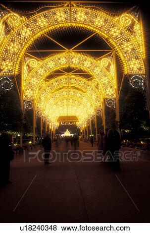 Stock Photo -  Disney World, Orlando, FL, Florida, Lake Buena Vista, Epcot, Christmas lights decorate Epcot Center at Walt Disney World in Lake Buena Vista. . Fotosearch