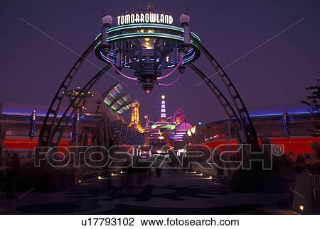 Stock Image -  Disney World, Orlando, Florida, FL, Magic Kingdom, Tomorrowland, Lake Buena Vista, Tomorrowland illuminated at night in the Magic Kingdom at Walt Disney World in Lake Buena Vista. . Fotosearch