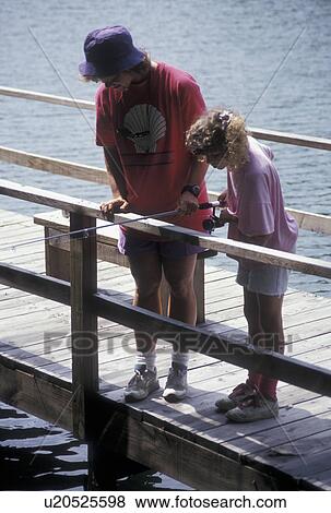 dock, fishing, lake, Chattahoochee National Forest, GA, Georgia, Mother and nine year old daughter fishing off a dock on Lake Tallulah in the Chattahoochee National Forest in North Georgia. View Large Photo Image Stock Photo - dock, fishing, lake, Chattahoochee National Forest, GA, Georgia, Mother and nine year old daughter fishing off a dock on Lake Tallulah in the Chattahoochee National Forest in North Georgia. . Fotosearch