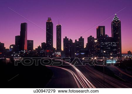 downtown skyline, Atlanta, Georgia, GA, Skyline of downtown Atlanta and traffic from Jackson Street at sunset. View Large Photo Image Stock Photo - downtown skyline, Atlanta, Georgia, GA, Skyline of downtown Atlanta and traffic from Jackson Street at sunset. . Fotosearch