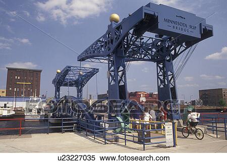 Stock Photography -  drawbridge, Duluth, MN, Minnesota, Lake Superior, Minnesota Slip Bridge, a pedestrian drawbridge, on Duluth Harbor in Duluth.. Fotosearch