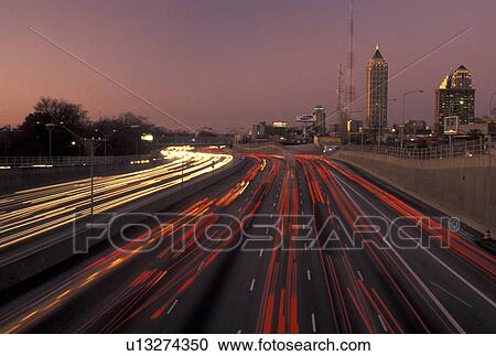 expressway, Atlanta, GA, Georgia, Traffic lights streak on I-75/I-85 at sunset in downtown Atlanta. View Large Photo Image Stock Image - expressway, Atlanta, GA, Georgia, Traffic lights streak on I-75/I-85 at sunset in downtown Atlanta.. Fotosearch