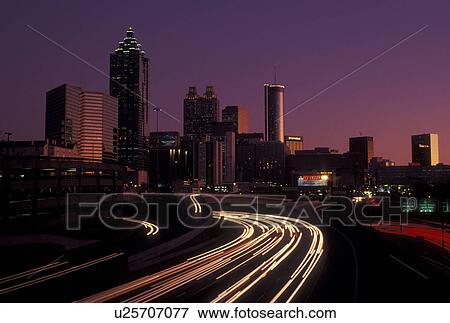 expressway, Atlanta, GA, skyline, Georgia, Traffic lights streak on I-75/I-85 at sunset and view of the skyline of downtown Atlanta. View Large Photo Image Stock Photo - expressway, Atlanta, GA, skyline, Georgia, Traffic lights streak on I-75/I-85 at sunset and view of the skyline of downtown Atlanta.. Fotosearch