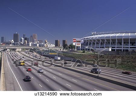 expressway, Atlanta, skyline, GA, Georgia, Skyline of Atlanta and Fulton County Stadium. Traffic on interstate I-85/75 in Atlanta. View Large Photo Image Stock Image - expressway, Atlanta, skyline, GA, Georgia, Skyline of Atlanta and Fulton County Stadium. Traffic on interstate I-85/75 in Atlanta.. Fotosearch