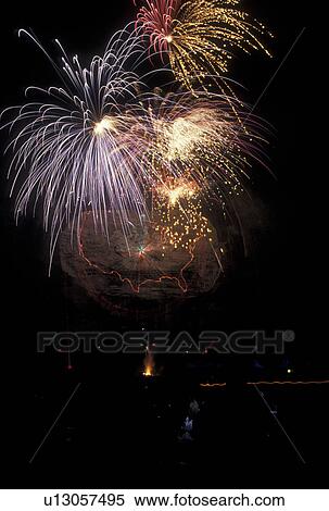 Stock Photography -  firework, laser show, Stone Mountain, Atlanta, GA, Georgia, Fireworks display at the Laser show on Stone Mountain at Georgia's Stone Mountain Park in Stone Mountain. . Fotosearch
