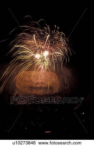 Stock Photograph -  fireworks, Stone Mountain, GA, Atlanta, Confederate Memorial Carving, Georgia, Firework display at the Laser Show on Stone Mountain a massive dome of granite rock at Georgia's Stone Mountain Park in Atlanta. . Fotosearch