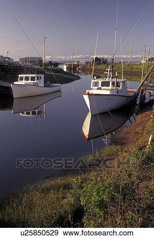 fishing boat, Nova Scotia, Toney River, NS, Canada, Gulf of St. Lawrence, Lobster fishing boats reflect in the calm water of Toney River in Nova Scotia. View Large Photo Image Stock Photo - fishing boat, Nova Scotia, Toney River, NS, Canada, Gulf of St. Lawrence, Lobster fishing boats reflect in the calm water of Toney River in Nova Scotia. . Fotosearch