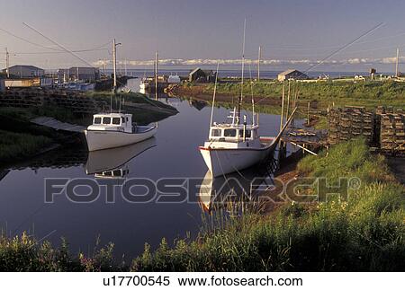 fishing boat, Nova Scotia, Toney River, NS, Canada, Gulf of St. Lawrence, Lobster fishing boats reflect in the calm water of Toney River in Nova Scotia. View Large Photo Image Stock Photography - fishing boat, Nova Scotia, Toney River, NS, Canada, Gulf of St. Lawrence, Lobster fishing boats reflect in the calm water of Toney River in Nova Scotia. . Fotosearch