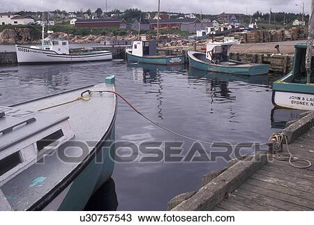 fishing boats, Cape Breton, Cabot Trail, Nova Scotia, NS, Canada, Atlantic Ocean, Scenic view of Neil's Harbor on Cape Breton Island on in Nova Scotia. View Large Photo Image Stock Image - fishing boats, Cape Breton, Cabot Trail, Nova Scotia, NS, Canada, Atlantic Ocean, Scenic view of Neil's Harbor on Cape Breton Island on in Nova Scotia. . Fotosearch