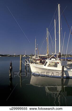 fishing boats, Cape Hatteras National Seashore, Outer Banks, North Carolina, Ocracoke, NC, Fishing boats docked in the harbor in Ocracoke on Cape Hatteras National Seashore on the Outer Banks. View Large Photo Image Stock Photography - fishing boats, Cape Hatteras National Seashore, Outer Banks, North Carolina, Ocracoke, NC, Fishing boats docked in the harbor in Ocracoke on Cape Hatteras National Seashore on the Outer Banks.. Fotosearch