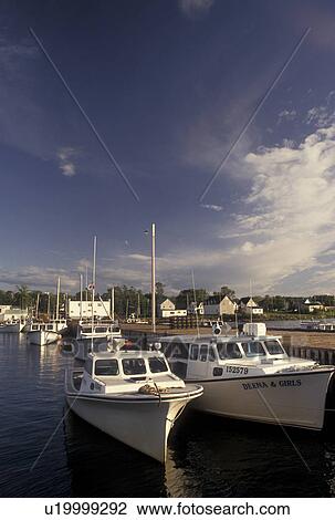 Stock Image -  fishing boats, Wallace, NS, Nova Scotia, Canada, Gulf of St. Lawrence, Lobster fishing boats docked in the harbor in the fishing village of Wallace on the Northumberland Strait in Nova Scotia. . Fotosearch