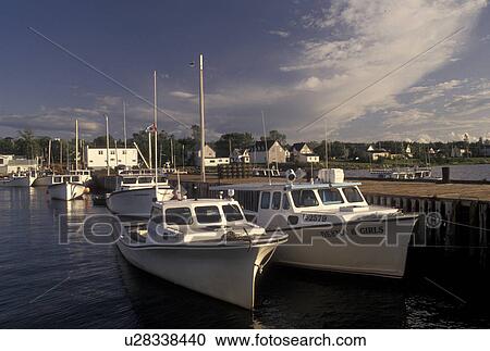 Stock Image -  fishing boats, Wallace, NS, Nova Scotia, Canada, Gulf of St. Lawrence, Lobster fishing boats docked in the harbor in the fishing village of Wallace on the Northumberland Strait in Nova Scotia. . Fotosearch