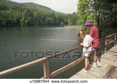 fishing, Chattahoochee National Forest, GA, Georgia, Mother and nine year old daughter fishing off a dock on Lake Tallulah in the Chattahoochee National Forest in North Georgia. View Large Photo Image Picture - fishing, Chattahoochee National Forest, GA, Georgia, Mother and nine year old daughter fishing off a dock on Lake Tallulah in the Chattahoochee National Forest in North Georgia.. Fotosearch