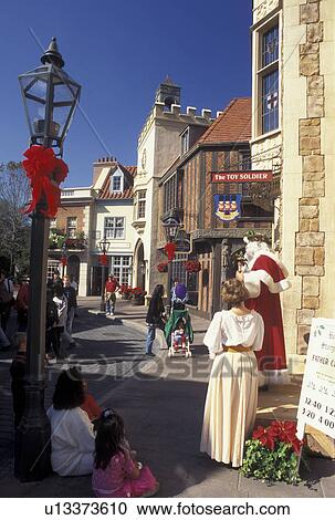 FL, Disney World, Orlando, Epcot, World Showcase, Lake Buena Vista, Florida, Father Christmas stands outside the United Kingdom presented at World Showcase during the Christmas holidays at Epcot Center in Walt Disney World in Lake Buena Vista. View Large Photo Image Stock Image - FL, Disney World, Orlando, Epcot, World Showcase, Lake Buena Vista, Florida, Father Christmas stands outside the United Kingdom presented at World Showcase during the Christmas holidays at Epcot Center in Walt Disney World in Lake Buena Vista. . Fotosearch