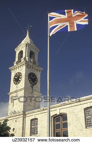 flag, clock tower, Bermuda, The West End, Sandy's Parish, The British Flag fly's outside the Clocktower at the Royal Naval Dockyard at the end of Ireland Island in Sandy's Parish in Bermuda. View Large Photo Image Stock Photo - flag, clock tower, Bermuda, The West End, Sandy's Parish, The British Flag fly's outside the Clocktower at the Royal Naval Dockyard at the end of Ireland Island in Sandy's Parish in Bermuda. . Fotosearch