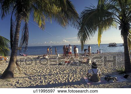 Florida Keys, beach, Key West, FL, Gulf of Mexico, Florida, Atlantic Ocean, People enjoying the day on Smithers Beach at Key West. View Large Photo Image Stock Photo - Florida Keys, beach, Key West, FL, Gulf of Mexico, Florida, Atlantic Ocean, People enjoying the day on Smithers Beach at Key West.. Fotosearch