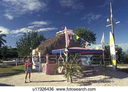 Florida Keys, Key Largo, FL, Gulf of Mexico, Florida, Atlantic Ocean, Pink hut boat rental shop in Key Largo. View Large Photo Image Stock Photograph - Florida Keys, Key Largo, FL, Gulf of Mexico, Florida, Atlantic Ocean, Pink hut boat rental shop in Key Largo.. Fotosearch