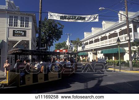 Florida Keys, Key West, FL, Gulf of Mexico, Florida, Atlantic Ocean, Conch Tour Train travels along Duval Street in Key West. View Large Photo Image Stock Photo - Florida Keys, Key West, FL, Gulf of Mexico, Florida, Atlantic Ocean, Conch Tour Train travels along Duval Street in Key West.. Fotosearch