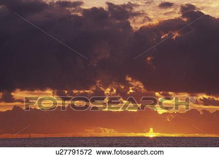 Florida Keys, sunrise, sunset, FL, Florida, Atlantic Ocean, The yellow sun rising over the Atlantic Ocean View Large Photo Image Stock Image - Florida Keys, sunrise, sunset, FL, Florida, Atlantic Ocean, The yellow sun rising over the Atlantic Ocean. Fotosearch